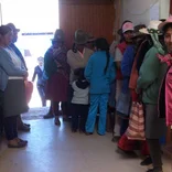 People in Peru lined up at a medical clinic.