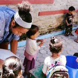 Interns working with children in Nepal 