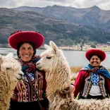 Peruvian women with llamas near Machu Picchu 