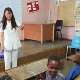 volunteer teaching in a classroom in Jamaica
