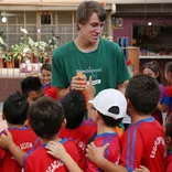 volunteer coaching group of children in Costa Rica