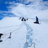 Mountaineering students resting towards the summit.