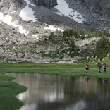 Students hike past mountain vista 