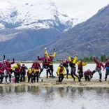 Students jump for joy during the sea kayaking section of the semester course.