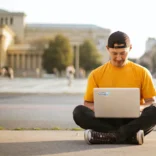 student working on his laptop 