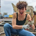 woman holding hammer