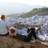 two students overlooking the city