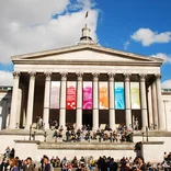 crowd in front of the National Gallery in Trafalgar Square in London