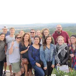 group of students standing at a lookout point of Vienna