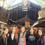 five students standing in front of the Boqueria Market in Barcelona