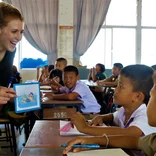Teaching children in a classroom in Thailand