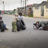 a photography intern in Cape Town capturing images of local children