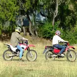 Riding motorbikes in the outback
