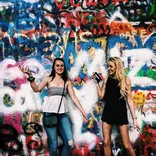 Students at the John Lenon Wall in Prague