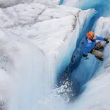 Rustic Pathways Teen traveler ice climbing in Alaska