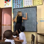 Volunteers help teach in classrooms