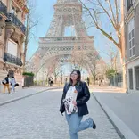 API Paris student poses with the Eiffel Tower