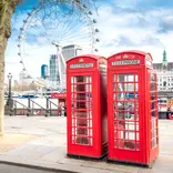 Iconic English phone booth and the London Eye