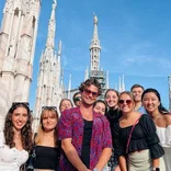 Students posing with celebrity in Milan