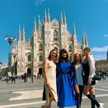 Participants pose in Milan