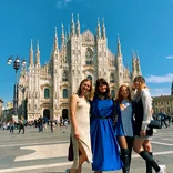 Participants pose in Milan