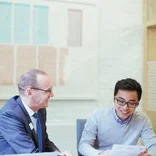 A student working with a professor