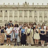 International Studies students in front of Madrid's Royal Palace during student tour. 