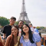 Students enjoying a river cruise in Paris