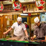 Chefs in kitchen in Japan