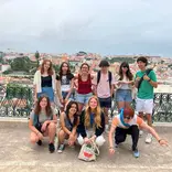 High school students posing as a group while studying abroad in Lisbon