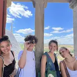 Students exploring castle in France