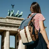 Student visiting Brandenburg Gate in Berlin