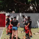 Volunteer teaching skateboarding