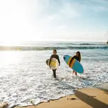 Girls surfing in Australia