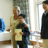 a junior student receives his Oxford International Study Centre certificate . 