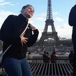 Student from IBS Winter One posing contently by the Eiffel Tower in Paris!