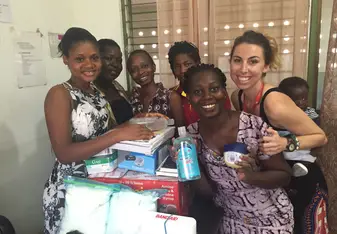 Giving supplies to clinic 