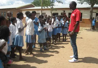 giving information to a school in Africa