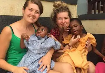 two women with children abroad