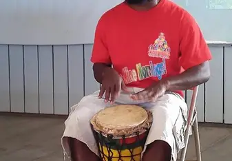 man playing drums 