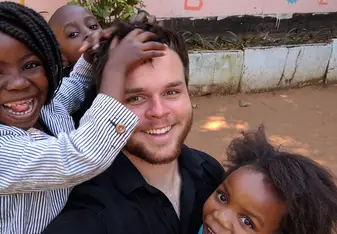 Volunteer with a few of his kids