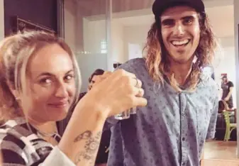man and woman with drinks