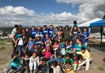 Volunteers and Kids in Quito, Ecuador market