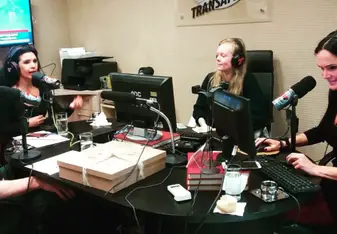 young women recording at radio station