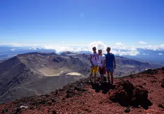 young meet at mountain summit