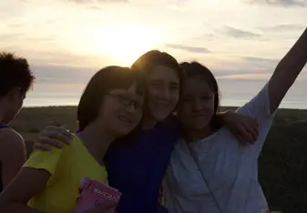 young girls at sunset