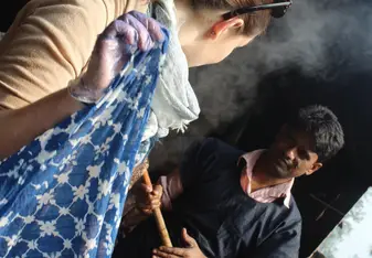 Dying silk textiles at Aranya with natural indigo dye