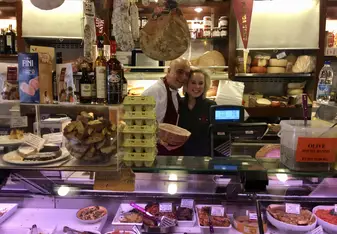 girl and shop owner in Florence, Italy