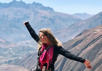 female in mountains
