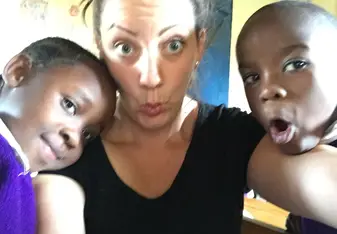 woman with two Tanzanian Boys